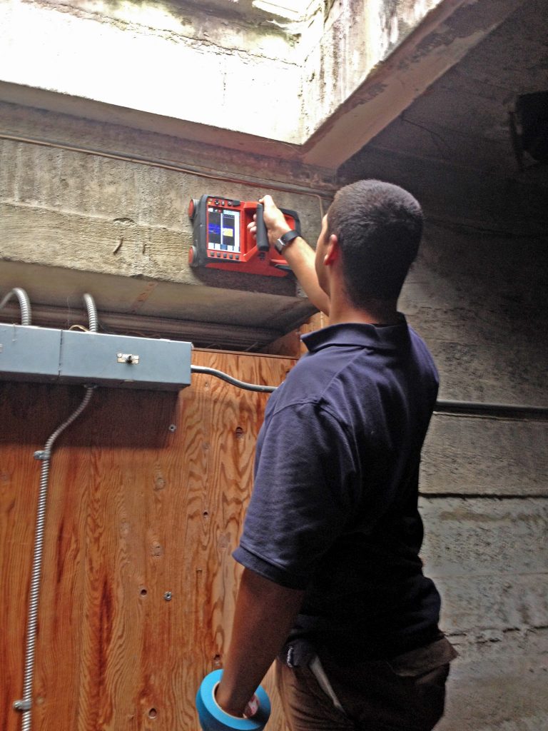 ARG using ground penetrating radar to survey vertical rebar in the wall