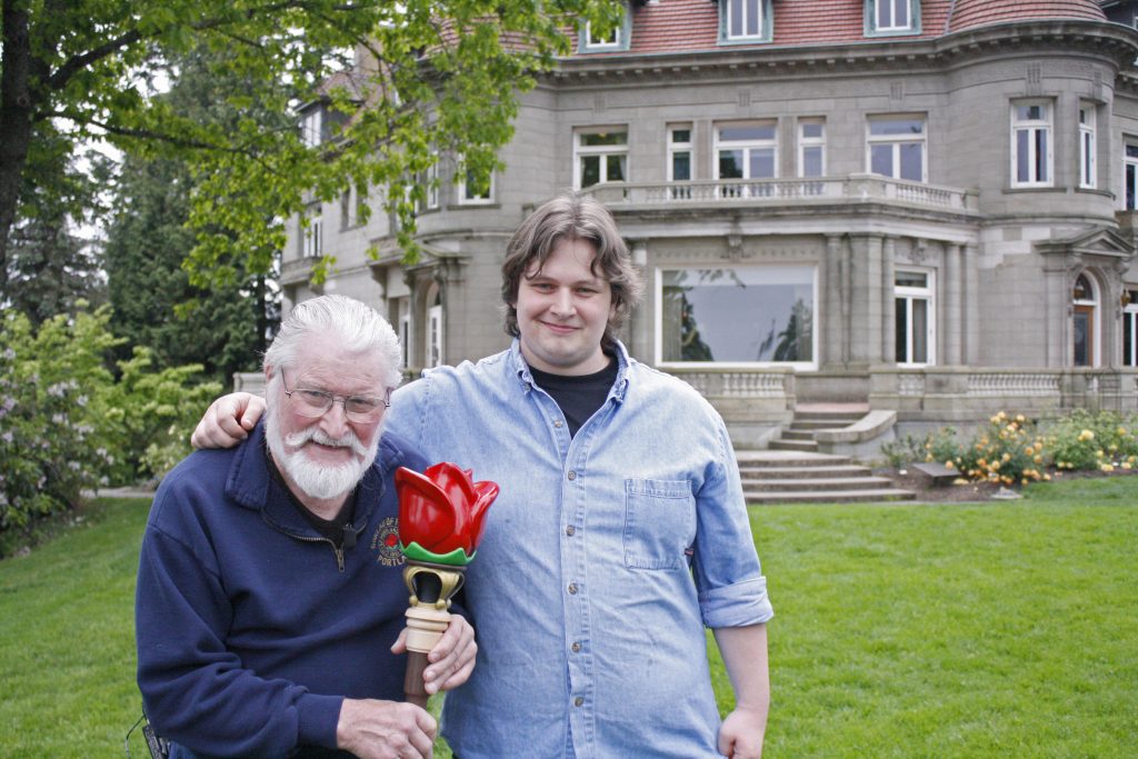 Merlyn and Rob Lewis proudly holding the new Clown Prince scepter
