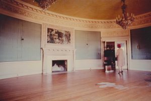 Stained wallpaper and floors in the Music Room